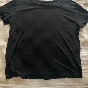 Black t-shift with “fashion” holes
